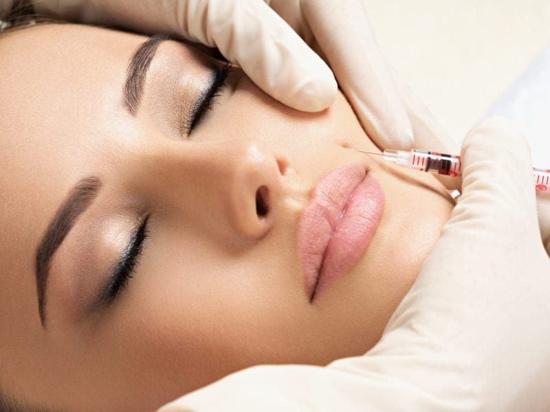 Closeup of Lip Injection - Botox, Hyaluronic, Juvaderm